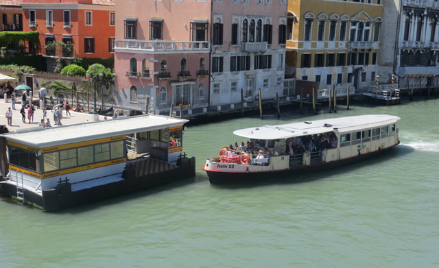 A route No 2 Vaporetto or water bus packed with passengers at the